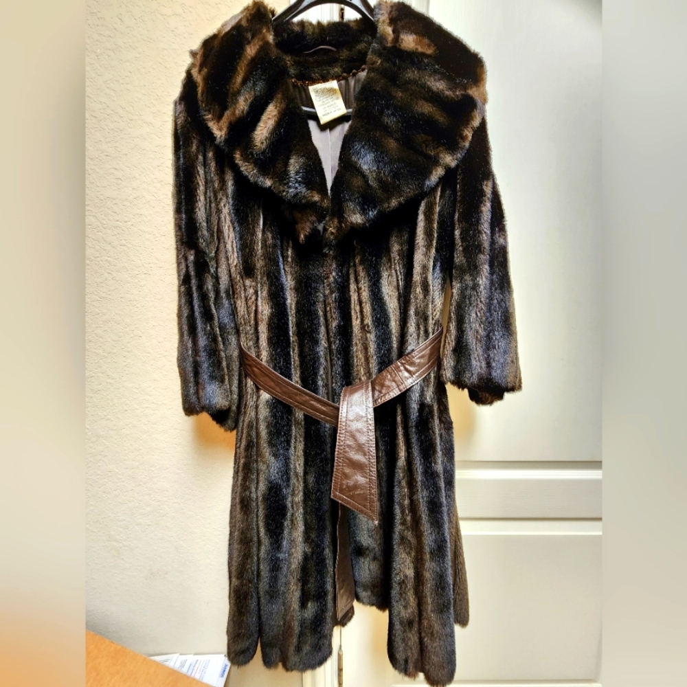 Knee length. Dark Brown Fur coat.